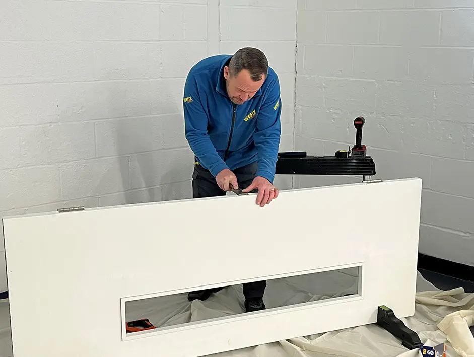 WeFix carpenter working on joinery