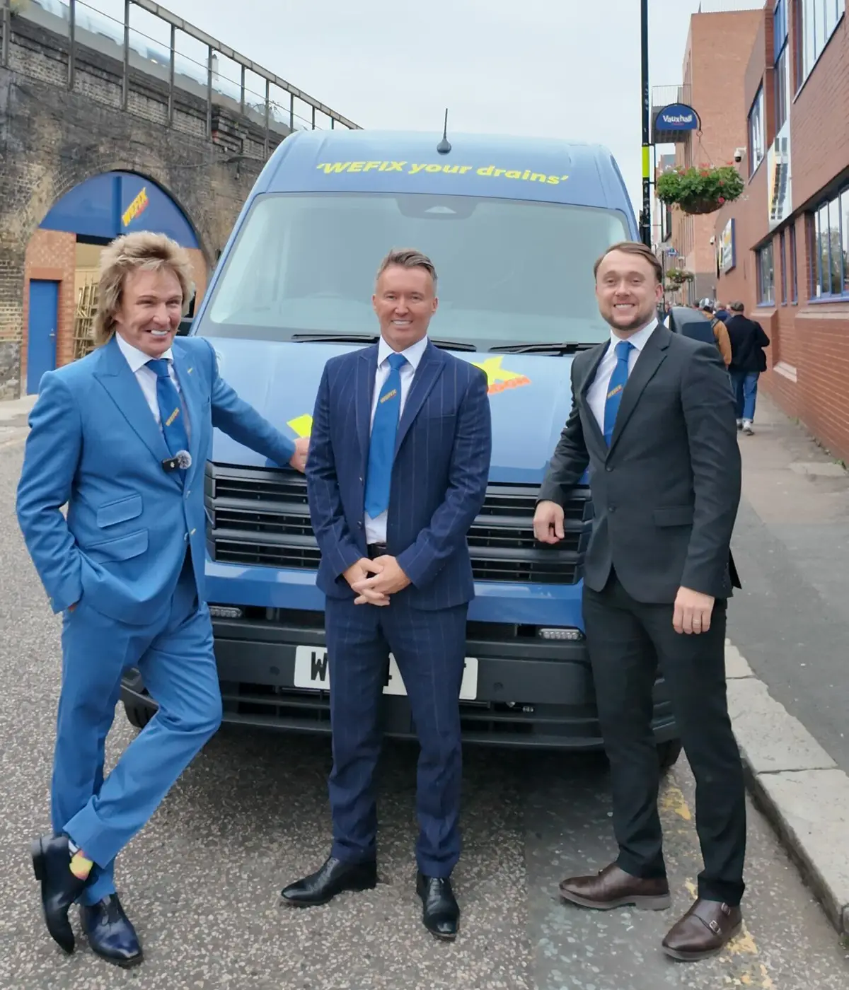 WeFix London directors standing beside a WeFix van